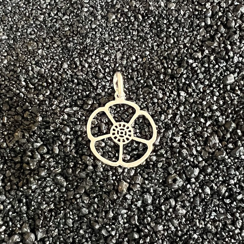 Auroville Symbol pendants